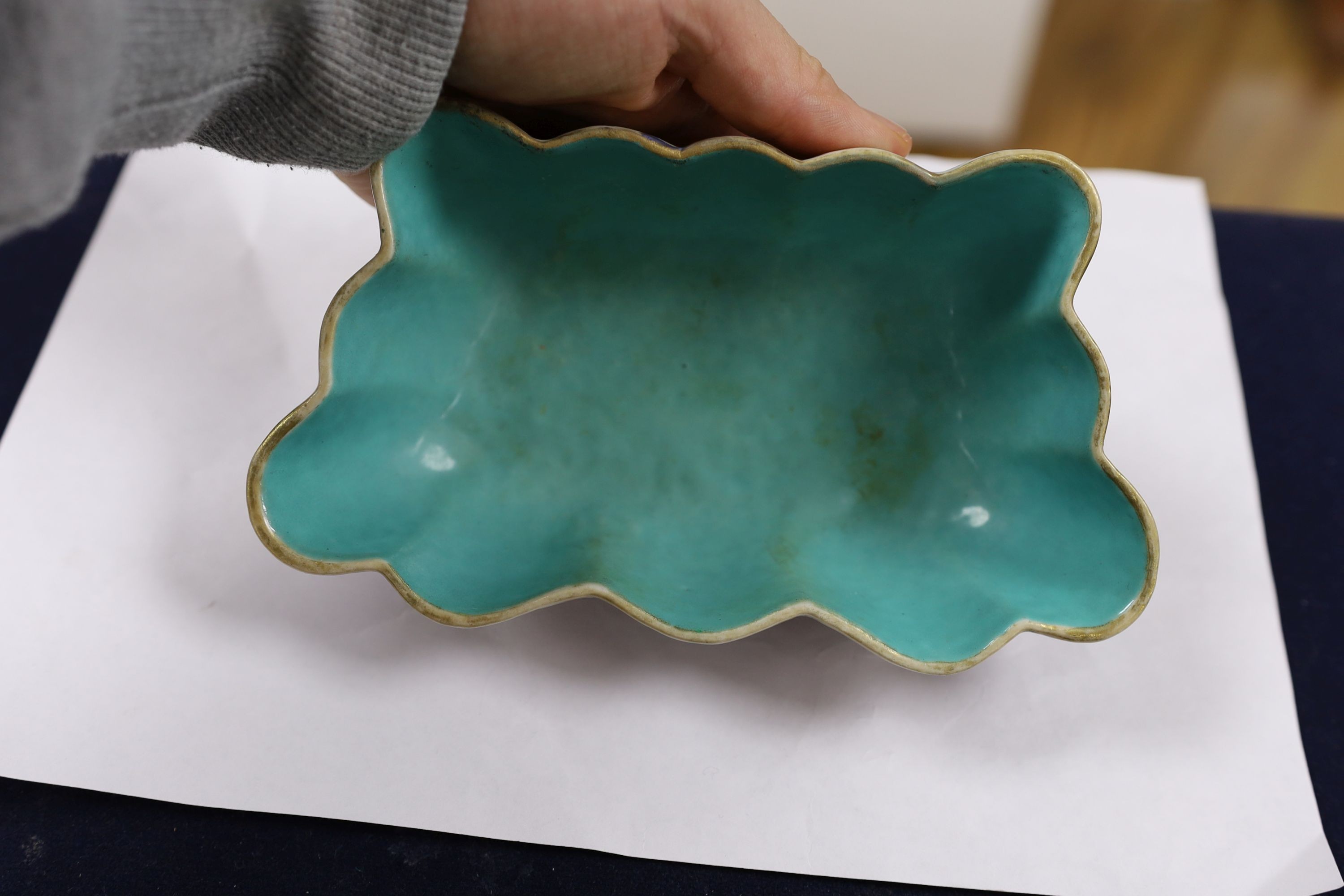 A Chinese enamelled porcelain ‘butterfly’ dish, 19th century, ground off reign mark, 19 cms wide at the front.